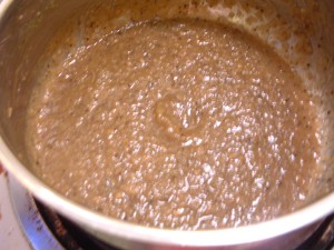 Ketchup after reduction, note the darker color and less mass.